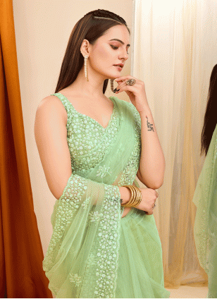 Pista green color Net Traditional Saree with Sequins work