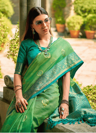 Competent Green Weaving work Traditional Saree