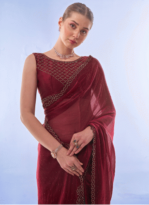 Maroon color Traditional Saree with Fancy Work work