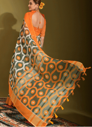 Printed work Orange color Linen fabric Printed Traditional Saree