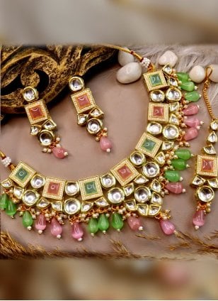 Jewellery Set in Green and Pink Enhanced with Kundan