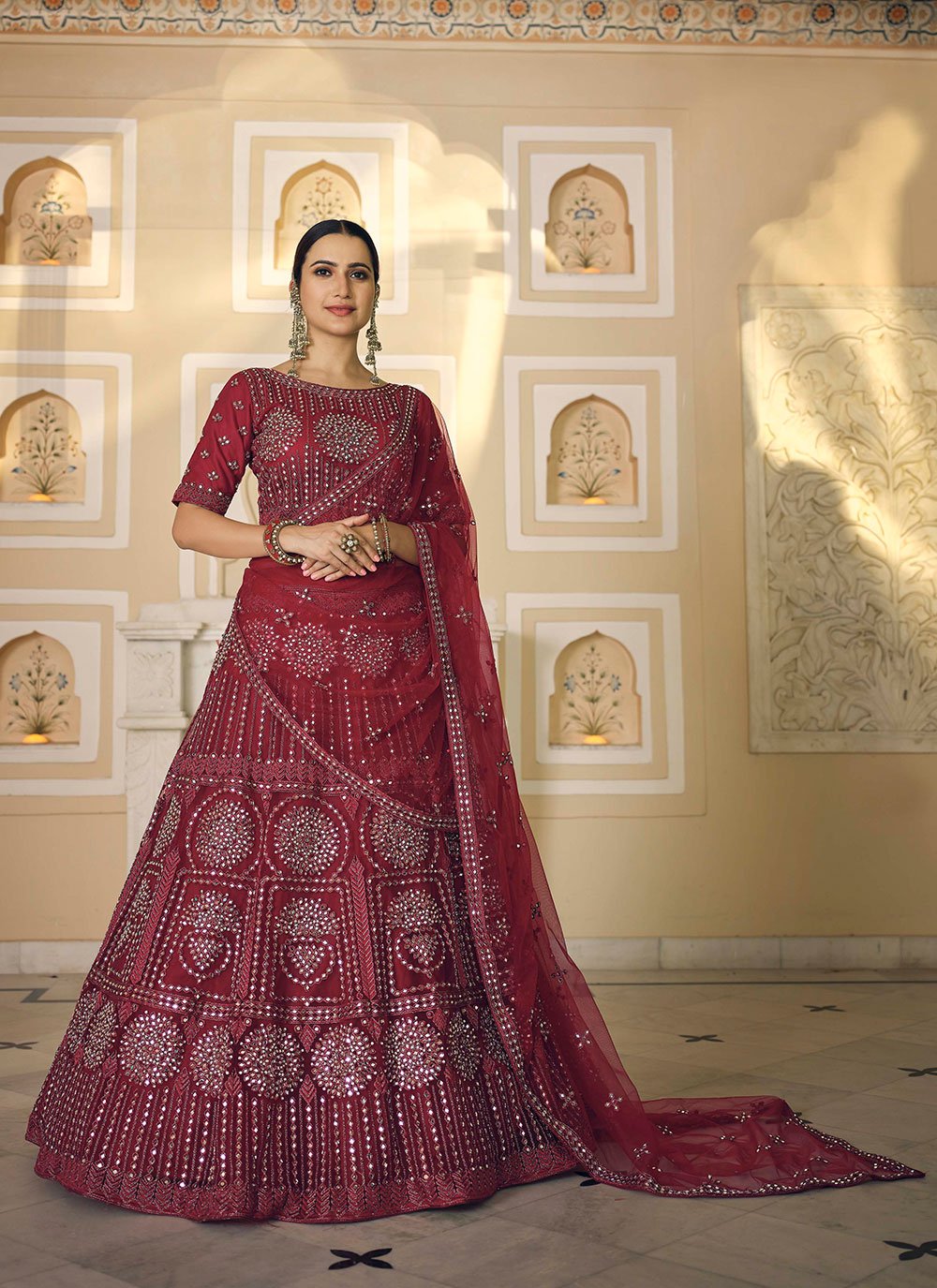 Isha Ambani's maroon Sabyasachi reception lehenga is for brides who love  classic styles | VOGUE India