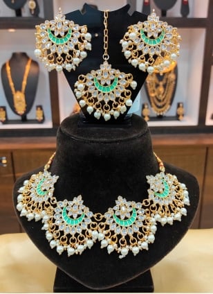 Anique gold bridal jewellery set - Indian Jewellery Designs