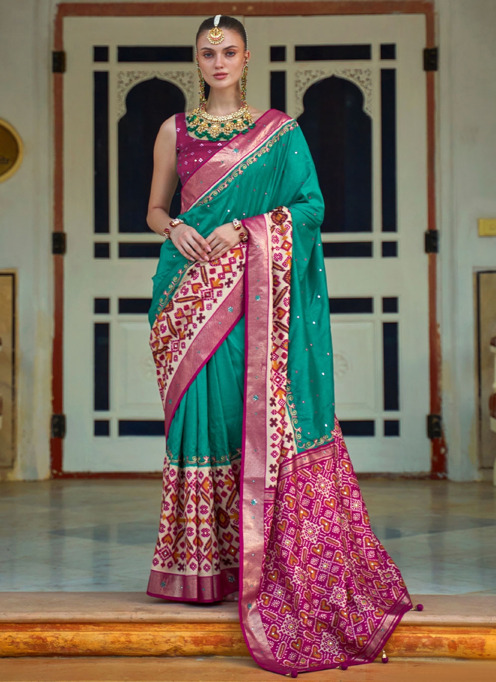 Pooja Hegde setting half saree goals in a green and pink a delightful blend  of tradition