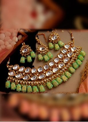 This Pista green Jewellery Set is Enhanced with Kundan