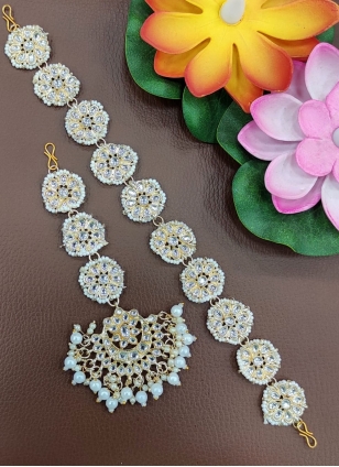 White hair Jewellery enhanced with Moti Work