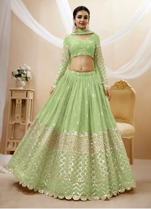 An Intimate Engagement With The Bride-To-Be In An Emerald Green Lehenga! |  WedMeGood