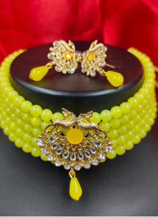 Yellow Jewellery Set enhanced with Alloy