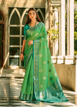 Competent Green Weaving work Traditional Saree
