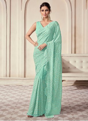 Shop Green lycra saree with foil print Party Wear Online at Best