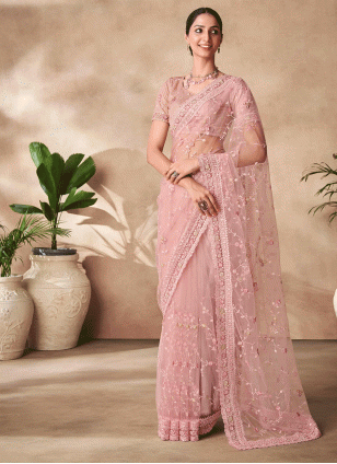 Sonorous Peach Embroidered work Traditional Saree